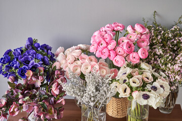 Set of white, pink and magenta flowers for Interior decorations. The work of the florist at a flower shop. Fresh cut flower.