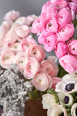 Set of white, pink and magenta flowers for Interior decorations. The work of the florist at a flower shop. Fresh cut flower.