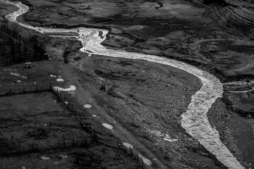 Naklejka premium BW landscape around Ananuri castle in winterat sunny day. Georgia