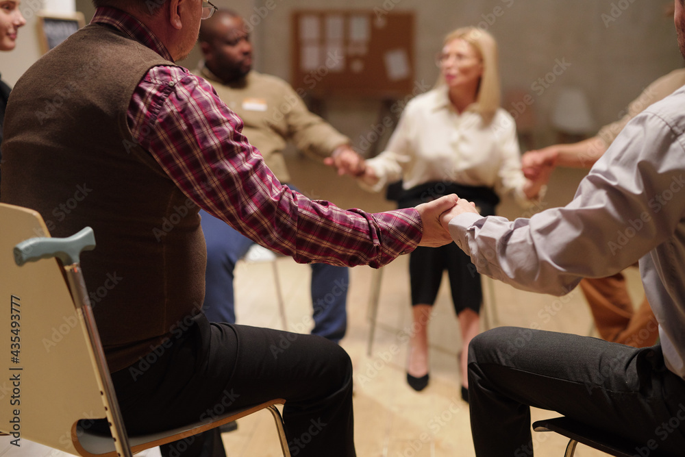 Poster patients of psychologist holding by hands during discussion of problems at session