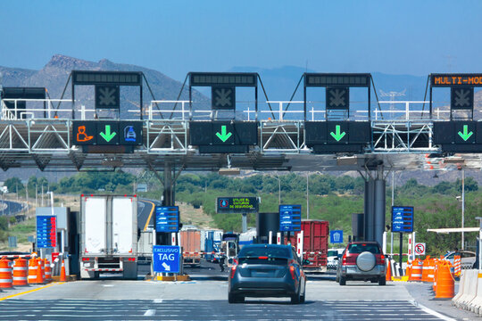 Cars At Toll Booth In Highway 