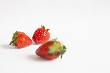 strawberries on a white