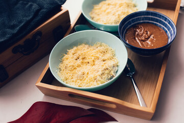 oatmeal with parmesan and salted caramel, breakfast on a tray