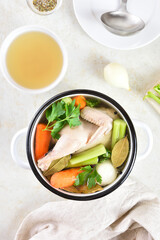 Chicken broth with vegetables and spices