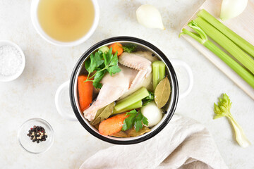 Chicken broth with vegetables and spices