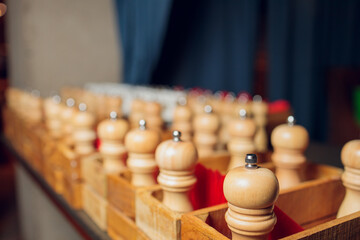 Number of wooden mills with salt and pepper in a restaurant. Shot with a small GRIP.