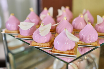 Festive sweet table. Cakes, cookies and mousses
