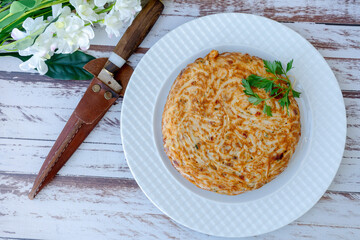 Omelette and whole noodle omelet on a plate. Aerial view. take landscape. Copy space.