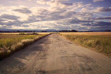 A road in the country with a beatiful sky