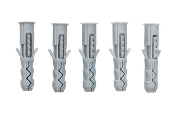 Plastic wall dowel plugs on white background. Close-up