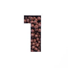Number one of chocolate cereal balls, white cut paper. First numeral. Typeface for healthy breakfast packaging design