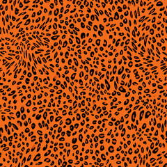 Abstract modern leopard seamless pattern. Animals trendy background. Orange and black decorative vector stock illustration for print, card, postcard, fabric, textile. Modern ornament of stylized skin