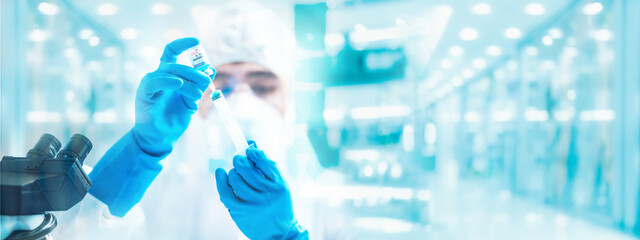 doctor working about medicine treatment in laboratory for test a coronavirus vaccine, virus disease injection medical, flu pandemic health with patient in hospital, epidemic, using syringe test tube