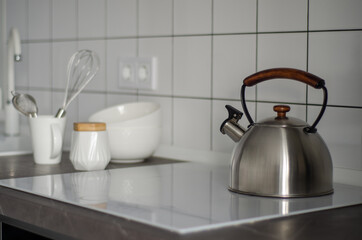Modern stylish scandinavian kitchen interior with kettle