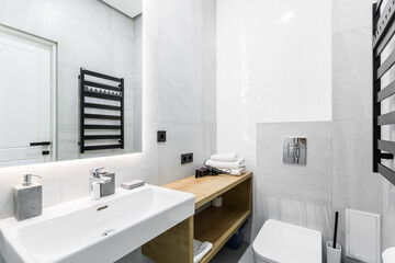 Fototapeta na wymiar interior photo, small bathroom, with white marble tiles, and shower