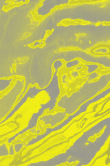 Iridescent background. Holographic wrinkled abstract foil texture. Glittering blurred surface pack in colors 2021. Vertical photo.