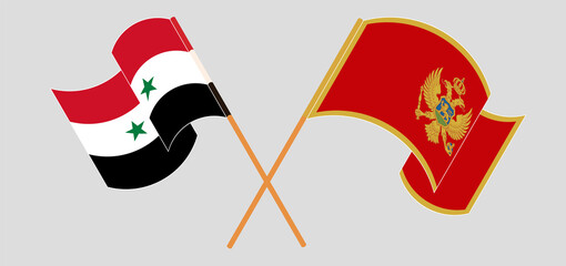 Crossed and waving flags of Syria and Montenegro