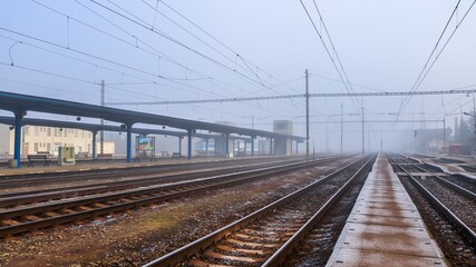 Fototapeta na wymiar Foggy railway station