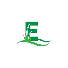 Letter E behind a green grass icon logo design vector