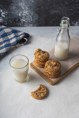 Homemade Tasty Cookies with Chocolate Chips with a Glass of Milk