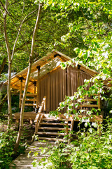 Fototapeta na wymiar wooden eco-friendly house in the forest