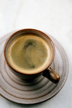 Espresso in cup with saucer 