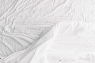 Fototapeta na wymiar White background top view of blanket on the bed.