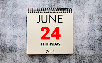 Save the Date written on a calendar - June 24