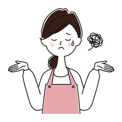 お手上げ状態のエプロンをつけた女性