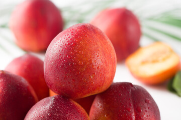 Group of whole nectarine fruits isolated on white background