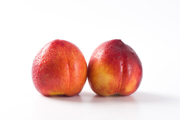 Group of whole nectarine fruits isolated on white background