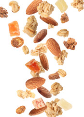 Delicious granola, almonds and dried fruits falling on white background. Healthy snack