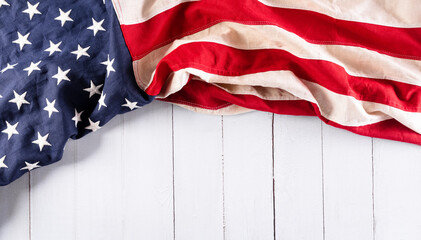 Happy Independence day: 4th of July, American flag on white wooden background