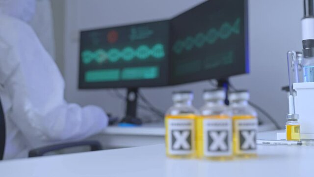 Group of scientist or researcher analyzing DNA of mutated virus in lab