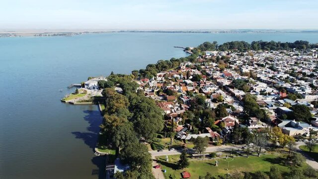 Beautiful Aerial Drone view of Chascomus town and Lagoon, Buenos Aires, Argentina.