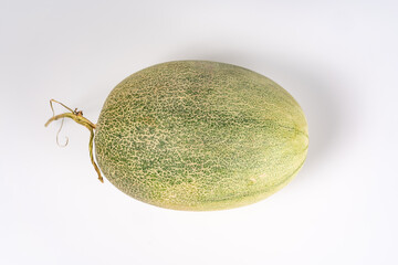 A whole Hami melon on a white background