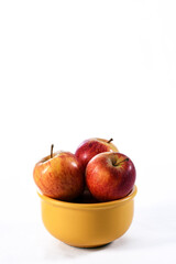 natural and healthy tropical fruit apple in the bowl on the table on blurred texture background