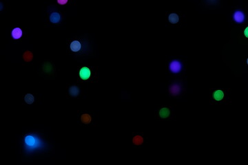 Blur background with black base color and colorful lights