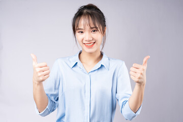 portrait of young businesswoman on white background