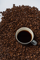 Coffee beans and coffee on a white background
