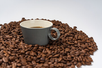 Coffee beans and coffee on a white background