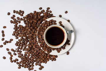 Coffee beans and coffee on a white background