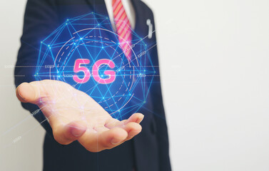 Businessman hand holding networking connection with 5G icon,virtual technology,,network concept