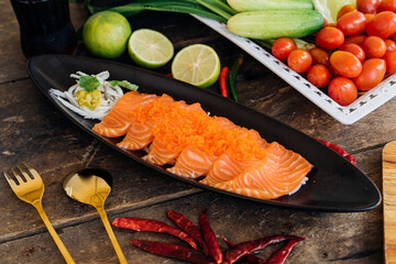 Salmon sashimi Japan food white plate on wooden table Restaurant menu decoration