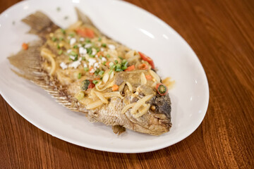 Spicy gourami fish salted egg, asian dish cuisine culinary