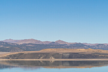 Mono lake, California in Autumn on sunny day with clear blue sky and tufa