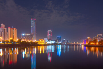 Night on a pond in the center of the city