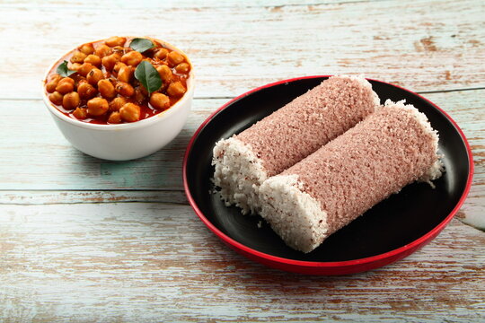 Healthy vegan diet food- steamed red rice puttu with chickpea curry. Tamilnadu, Kerala foods.