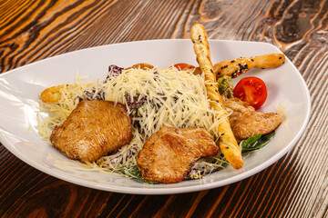 Caesar salad with roasted chicken