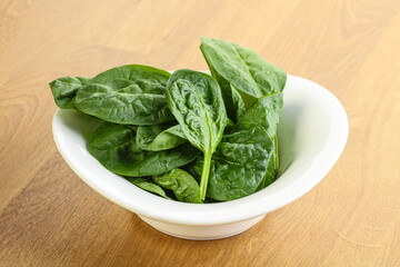 Fresh green spinach leaves in the bowl